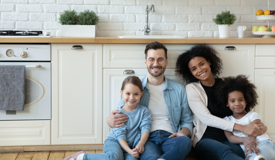 Family sitting together and smiling